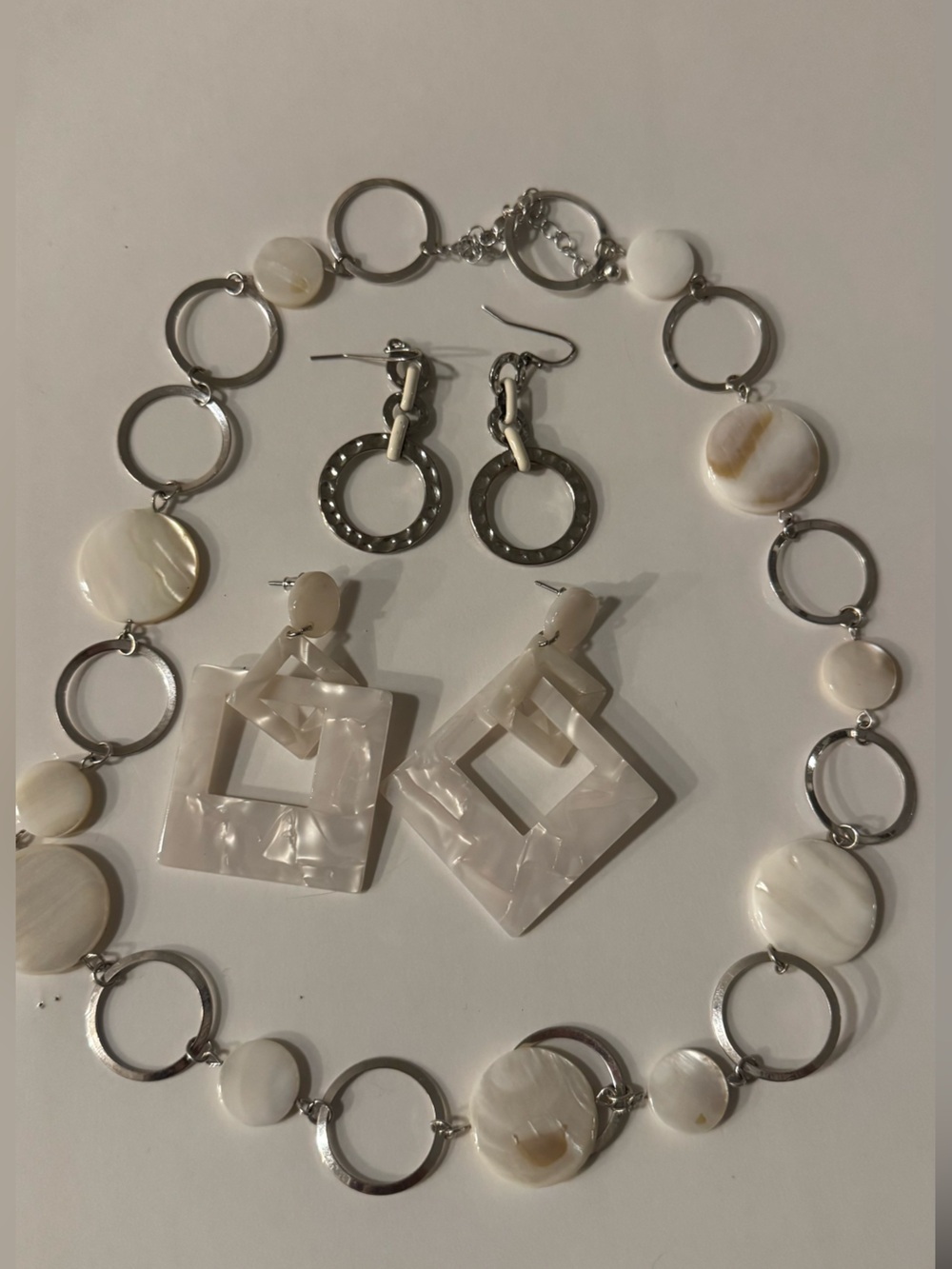 Pearl White and silver necklace and earrings combo.